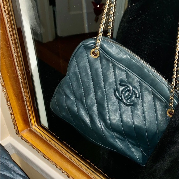 CHANEL Handbags - CHANEL NAVY BAG GOLD TRIM.